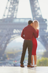 Romantic couple in love near the Eiffel tower