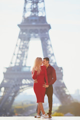 Romantic couple in love near the Eiffel tower