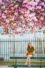 Woman walking in Paris on a spring day