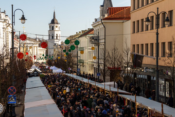 Kaziukas fair 2019 at Vilnius, a lot of people are crosing at Mindaugas Avenue, photo taken from...