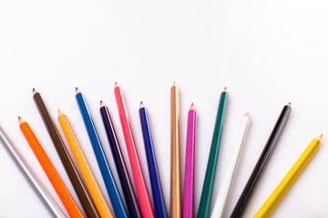 Colored pencils isolated on white background