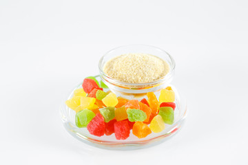 Gelatin and colorful jelly isolated on white.