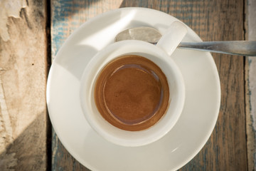 Espresso coffee in the beach in a sunny day.