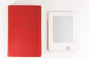 Digital e-book reader with a blank screen with old paper book isolated on white background