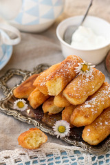 Sweet fried ricotta donuts fritters with powdered sugar