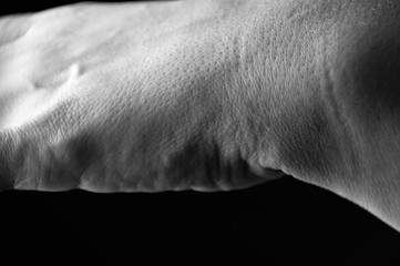 Woman. Hands on black background