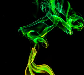 Colored smoke on black background