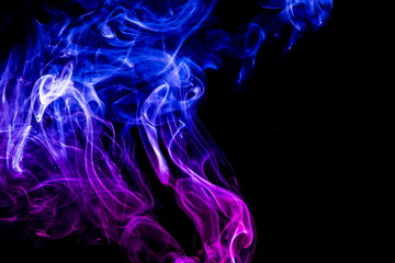 Fototapeta premium Colored smoke on black background
