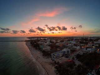 Beautiful Sunset, Colorful Sky over Playa del Carmen in Mexico. Aerial View on coast of Caribbean Sea and Beach  © Maciej