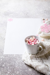 Obraz na płótnie Canvas Creative winter natural composition cup of hot chocolate and marshmallows, with decoration pink color Flat lay Greeting card copy space.Christmas background Festive Drink concept.
