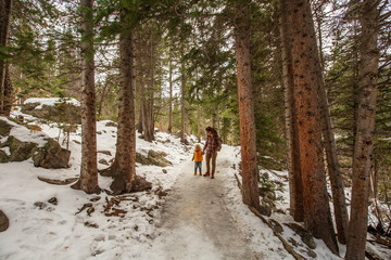 Family in Rocky mountains National park in USA