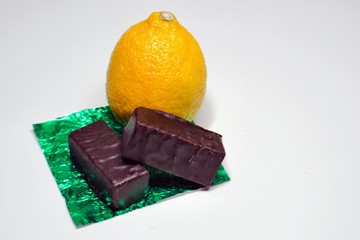 lemon on a white background and chocolate