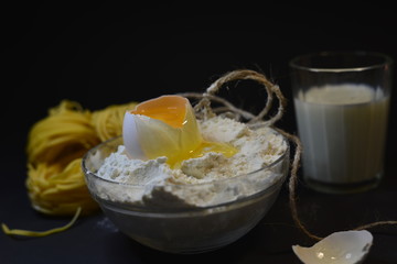 egg in flour and pasta and milk