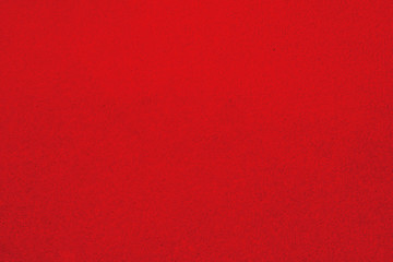 Soft bright red carpet as background, top view