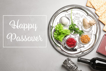 Flat lay composition with symbolic Passover (Pesach) items on color background, space for text