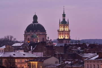 Evening Lviv. View of the central part of the city and churches:  Church of the Holy Communion, Korniakt Tower.
