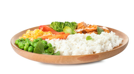 Plate with tasty rice, vegetables and meat on white background