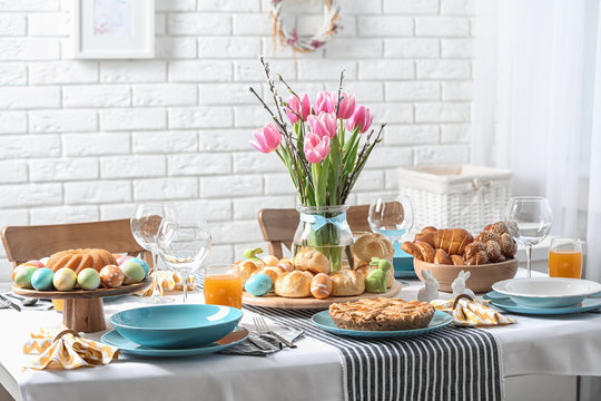 Festive Easter table setting with traditional meal at home