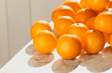 Fresh juicy oranges on table, space for text. Healthy fruits