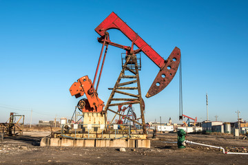 Oil pumps are in operation at the oil field