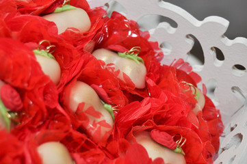 Table of colorful wedding candies.