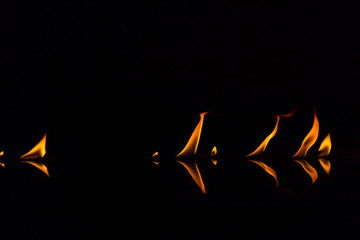 Fire flames on a black