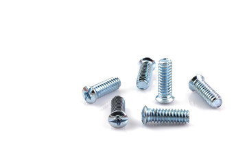 screwed screws nuts against isolated on white