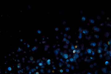 Fototapeta premium Luxurious Blue bokeh texture on black