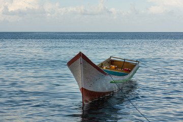 Fototapeta premium wooden boat parked at the beach