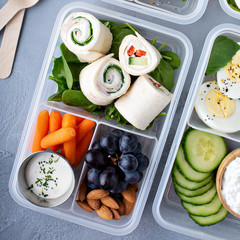 Healthy lunch or snack to go with tortilla wraps, eggs, cottage cheese, fruits and vegetables