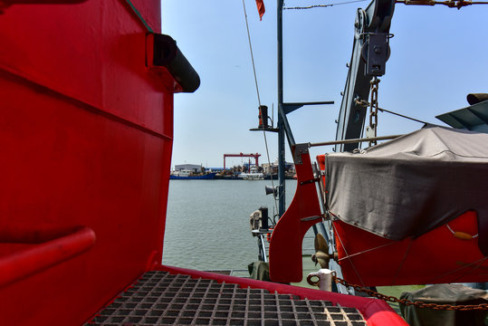 Close-ups of various vessels undergoing maintenance and repair