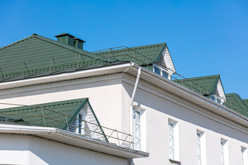 house facade against blue sky background