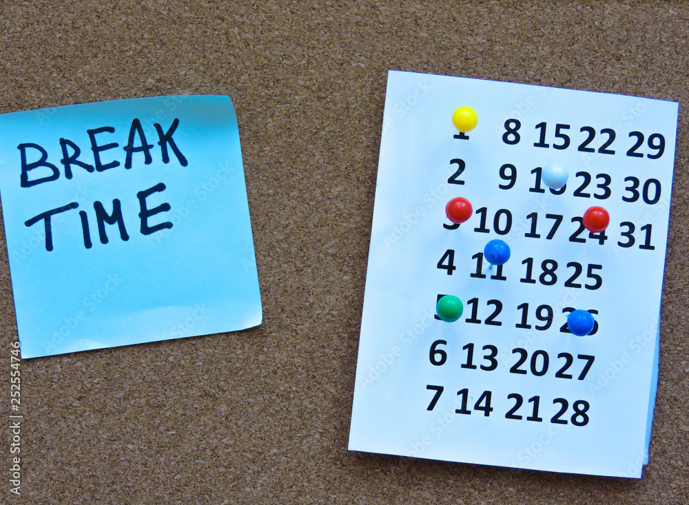 Fototapete planning a project-close up.thumbtack in calendar concept for busy,work space.business meeting sched