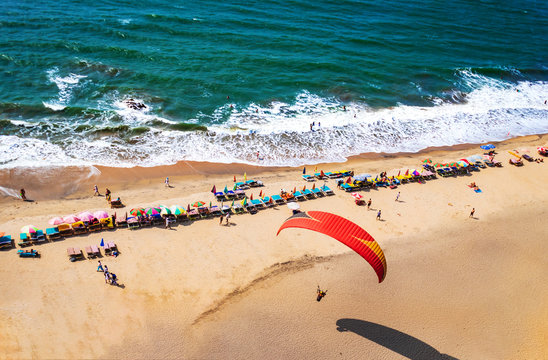 Paragliding on the beach of Arambol in Goa,India
