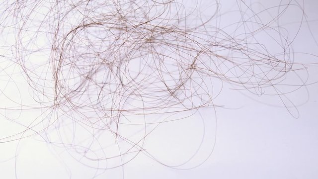 Hair falling into floor, Hair loss concept