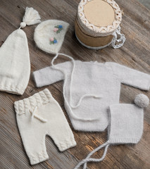 Fototapeta na wymiar knitted newborn baby clothes