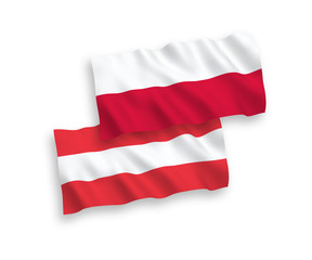 National vector fabric wave flags of Austria and Poland isolated on white background. 1 to 2 proportion.