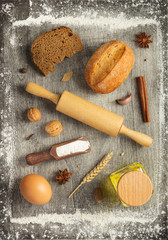 Fototapeta na wymiar bakery ingredients on wooden background