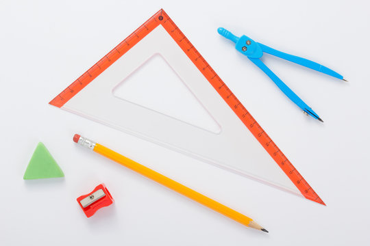 school set and ruler at white background
