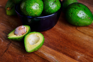 A dish full of rip avocados