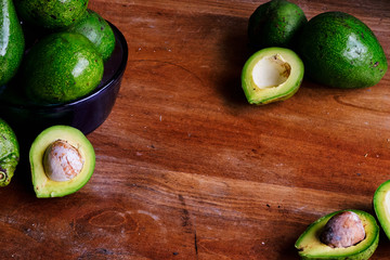 Ripe avocados on a rustic table