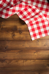 checked cloth napkin at wooden table