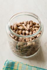 Pistachio Nuts with Shell in Jar / Glass Bowl.