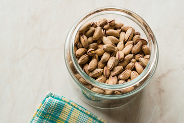 Pistachio Nuts with Shell in Jar / Glass Bowl.