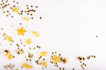 gold sequins on white background