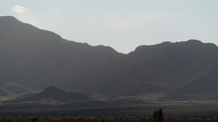 Hazy Mountains During a Windy Day at Sunset Farmland Countryside