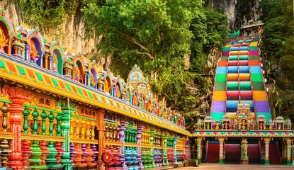 Fotobehang Colorful stairs of Batu caves, Malaysia. Panorama © Olga Khoroshunova