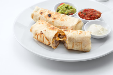 close up view of nice fresh yummy Mexican burritos on white back