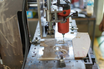 DIY Mini CNC Machine for 3D carving. Process of 3D cutting, machining and sculpting. Cutting 3D text on the workpiece