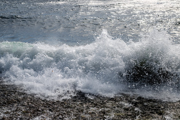 waves and splashes by the sea